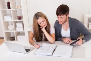 couple looking over their life insurance plan details